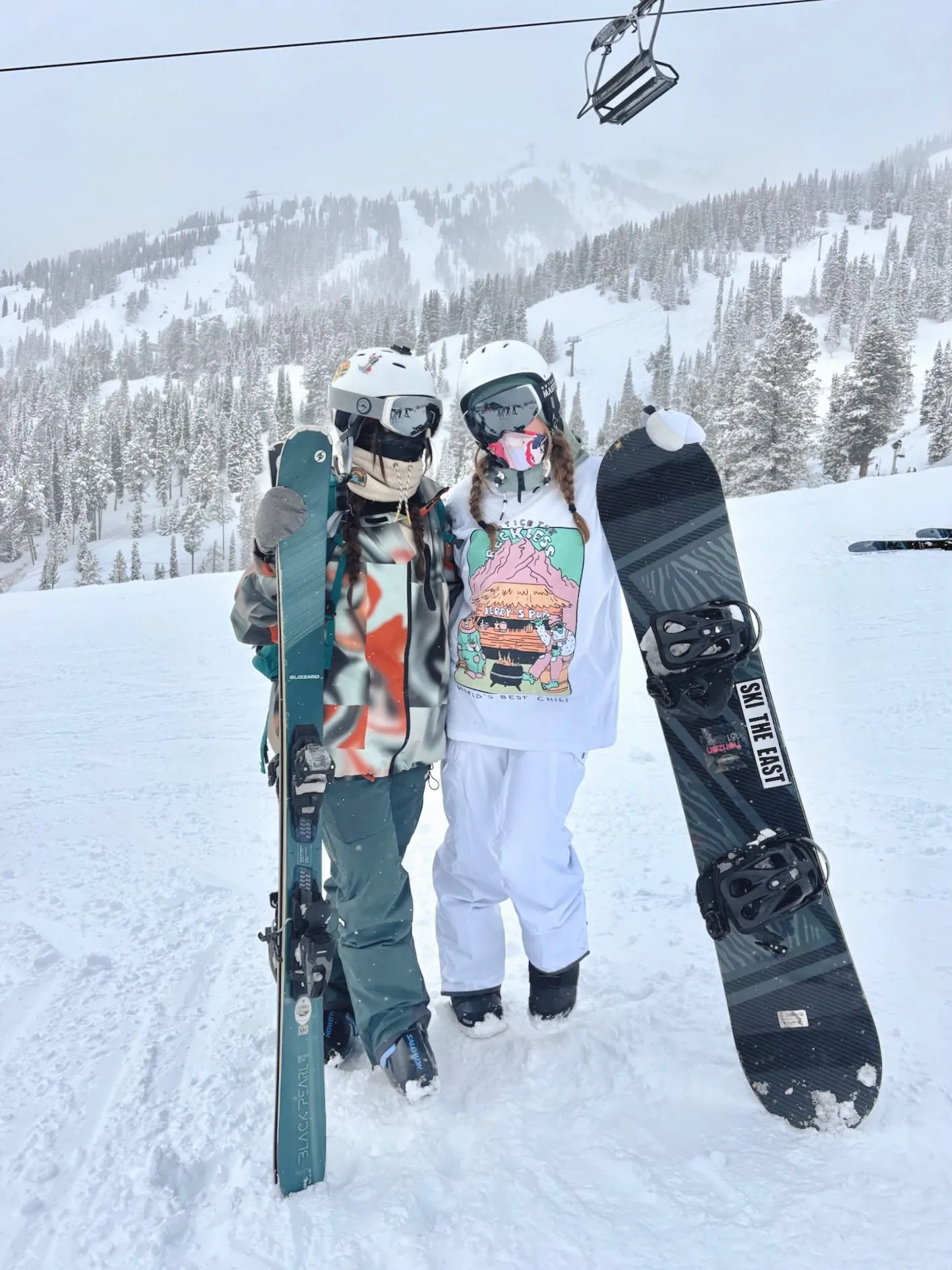 Two with boards mountain
