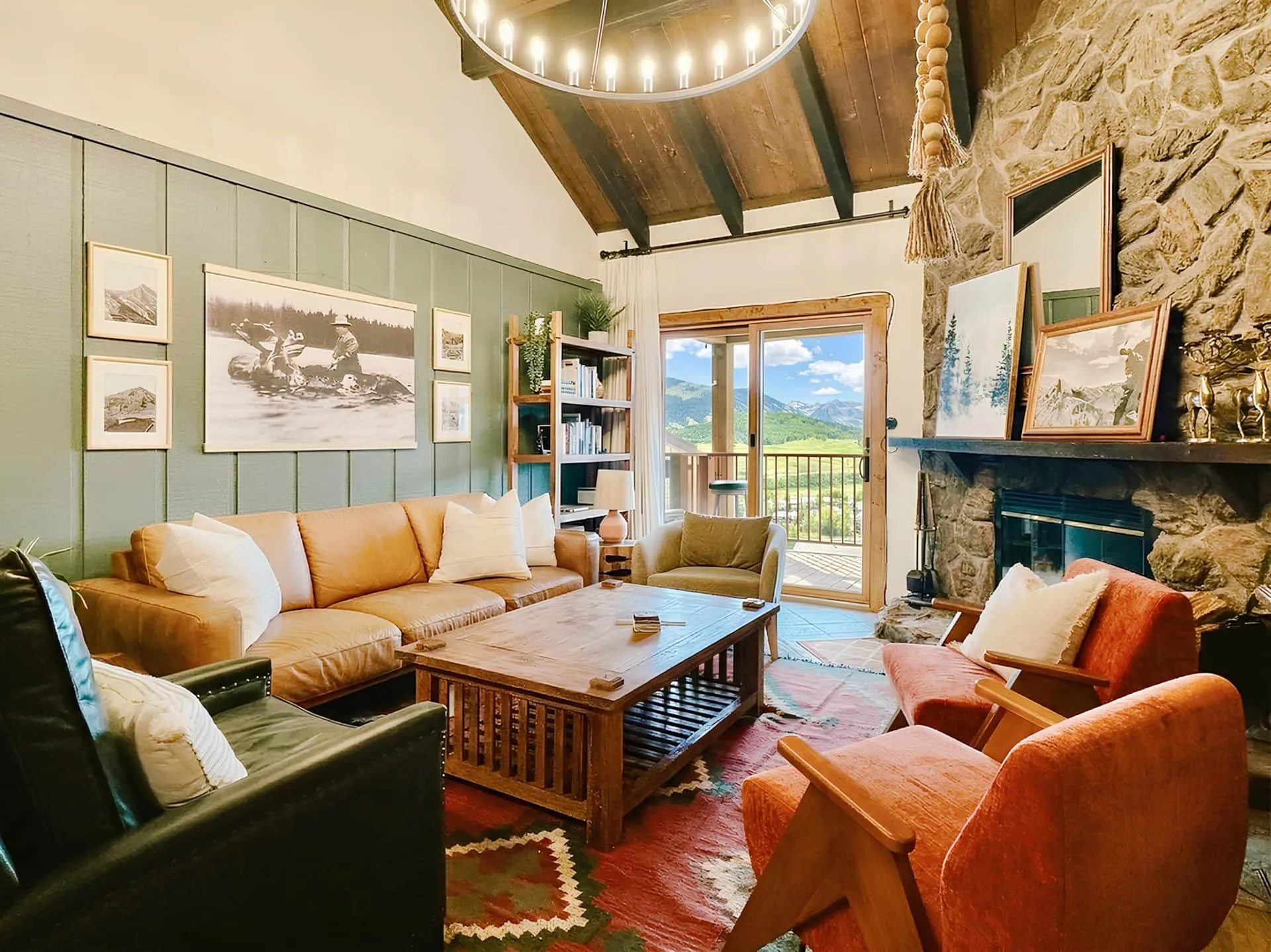 Elkhorn Lodging suite living room with stone fireplace